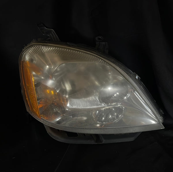 05 Ford 500 Head lamp Left side