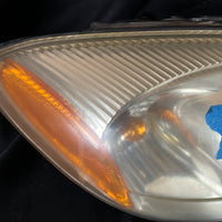 02 Ford Taurus Head lamp Right side